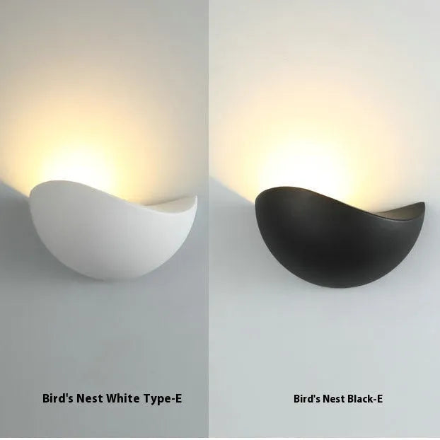 Black bird's nest style aluminium LED lamp with IP65 rating for courtyard and bedroom use.