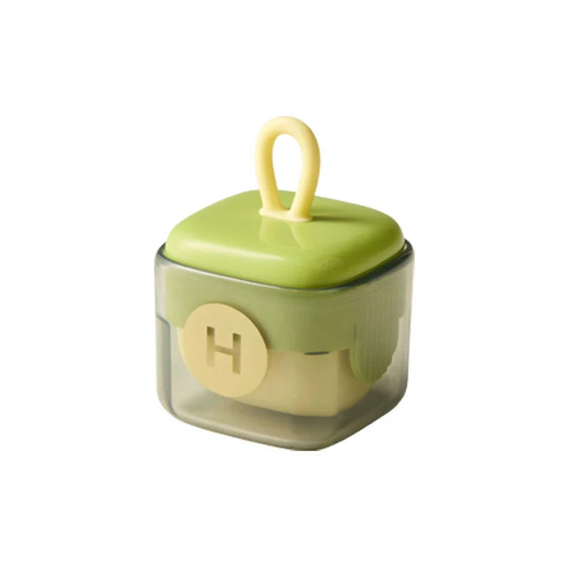 Green and yellow portable lint remover ball with ABS TPE material for gentle fabric care