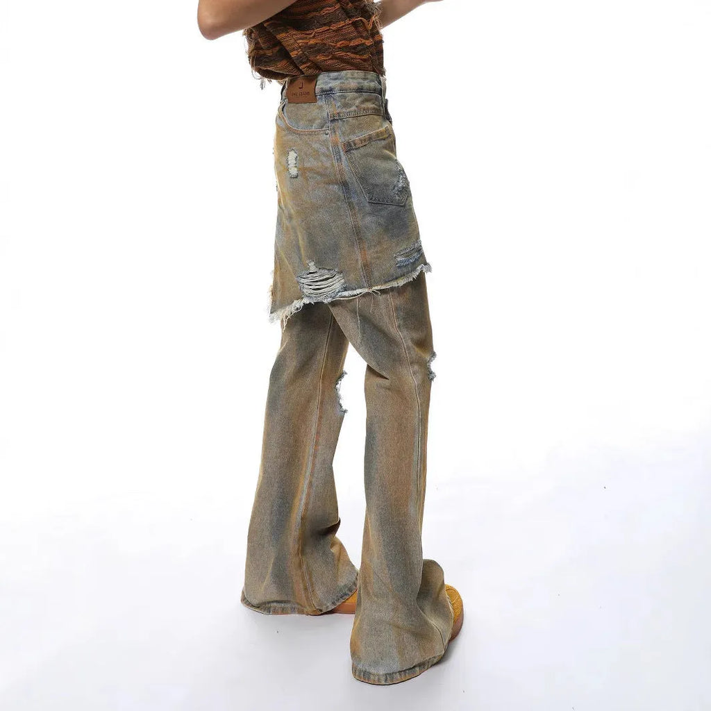 Women's loose hole bootcut jeans in picture colour with a high waist and button fly.