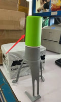 Green Uutensil Stirr automatic cooking mixer device for stirring sauces and soups.
