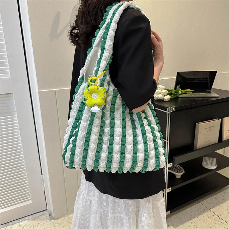 Women's pleated bubble handbag in five colour options with three-dimensional pockets