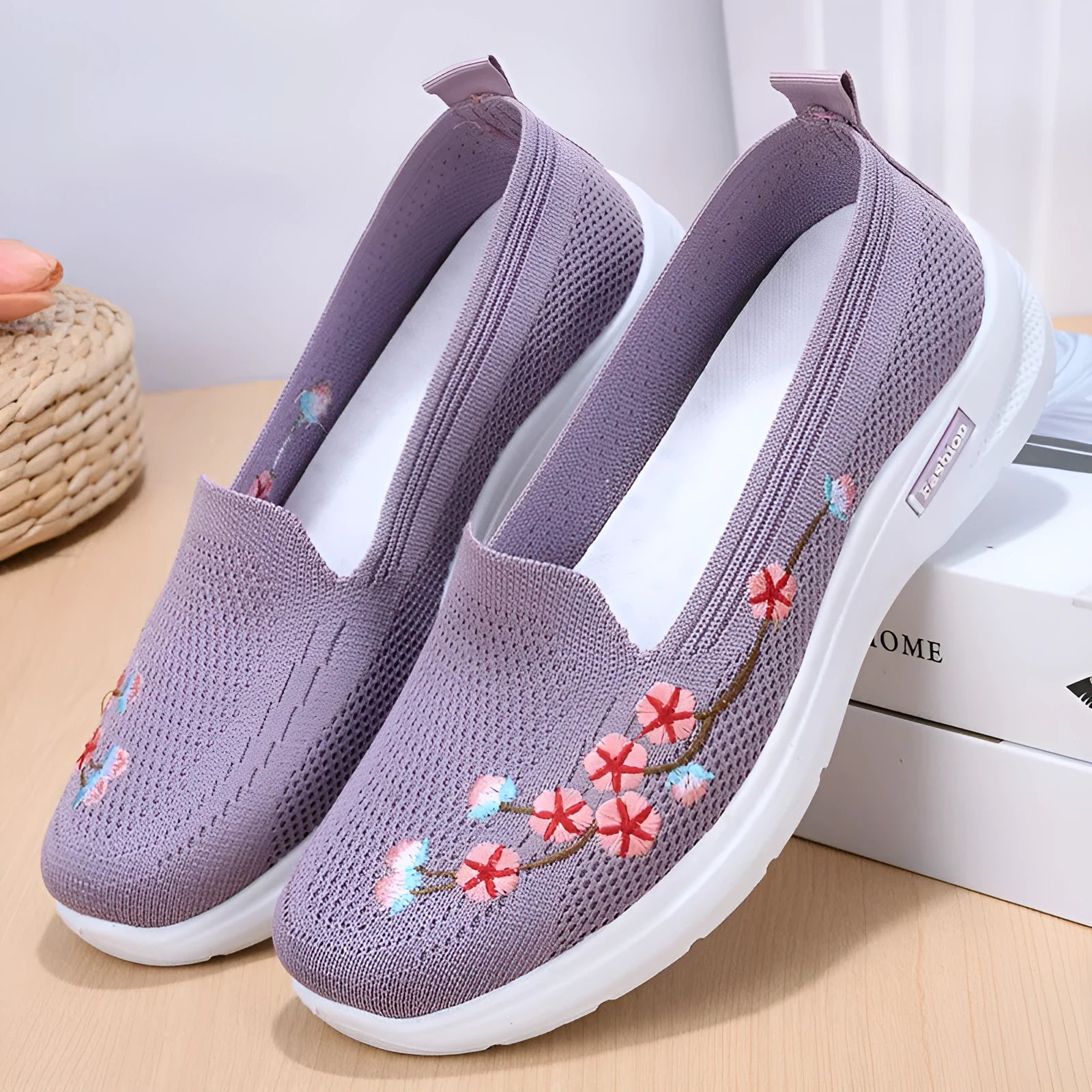 Women's embroidered flywoven casual flat pumps in wine red, shown on a white background.