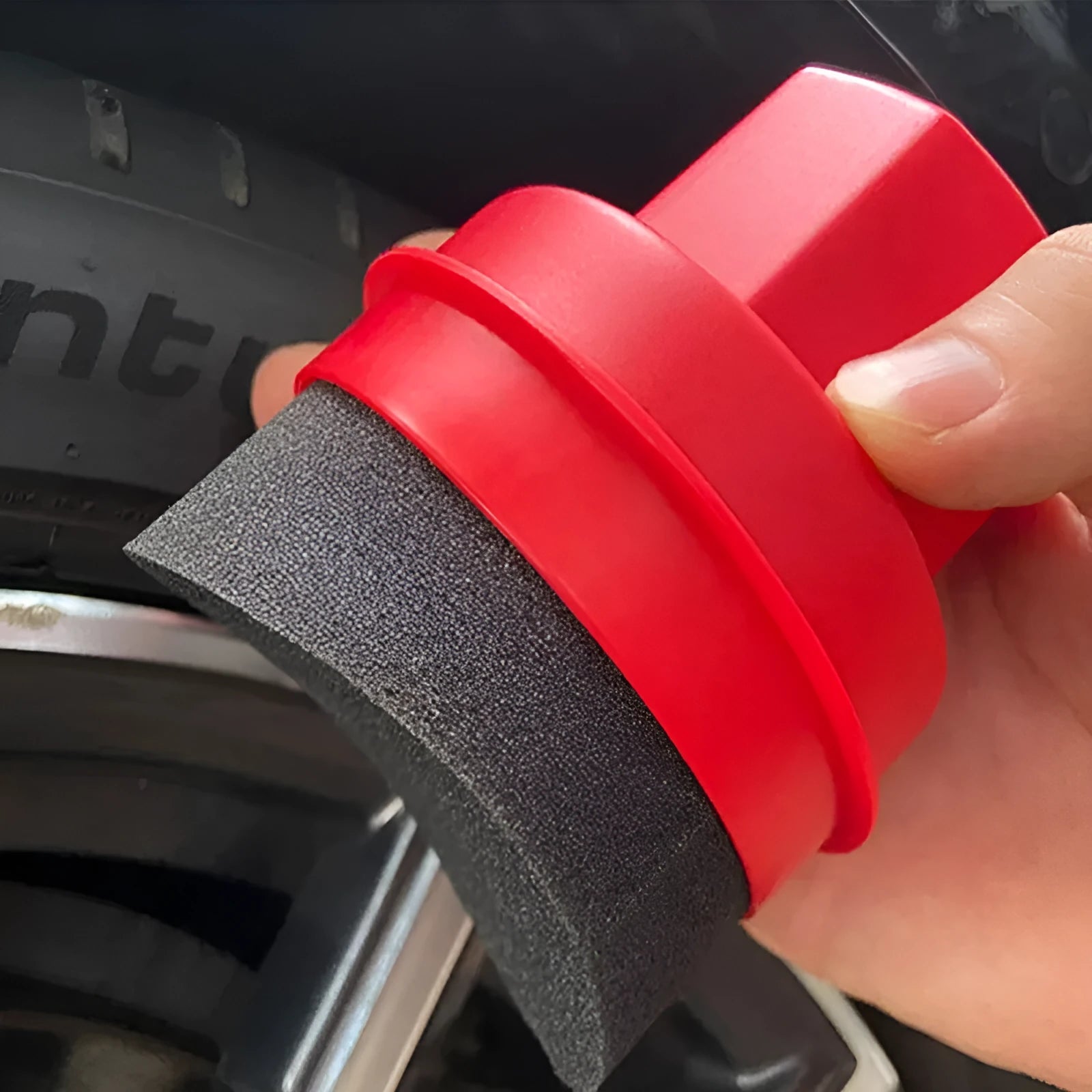 A black tyre polishing sponge brush with a lid, showing its high-density sponge applicator head.