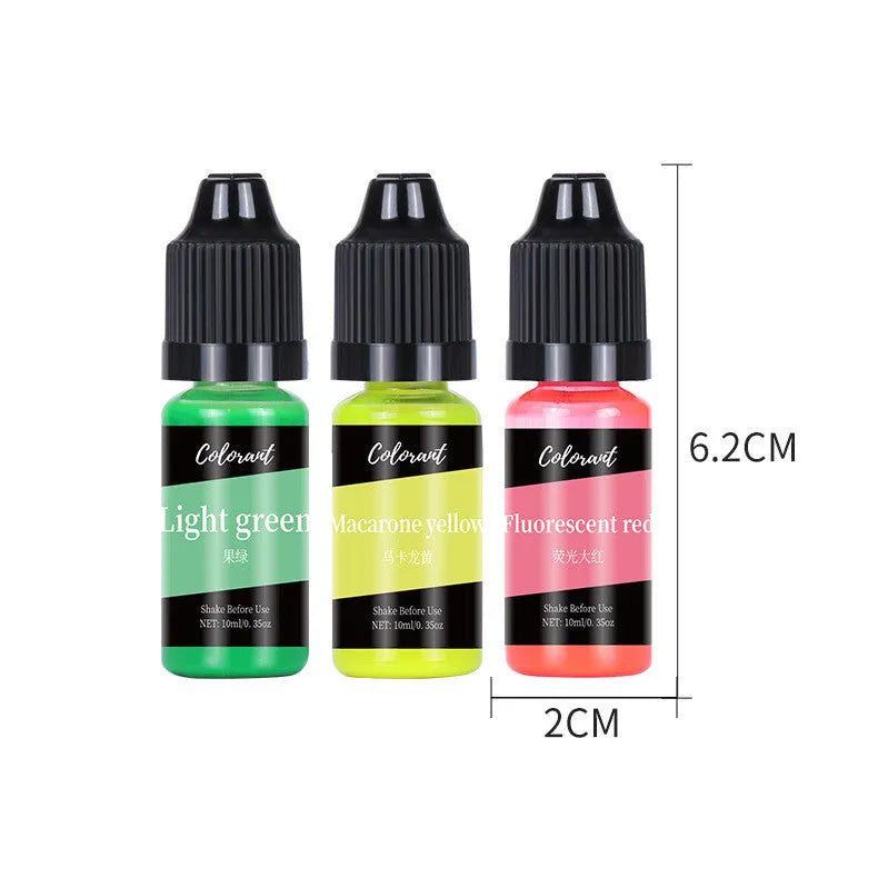 Set of 30 small bottles containing concentrated candle and soap dye pigments in various colours