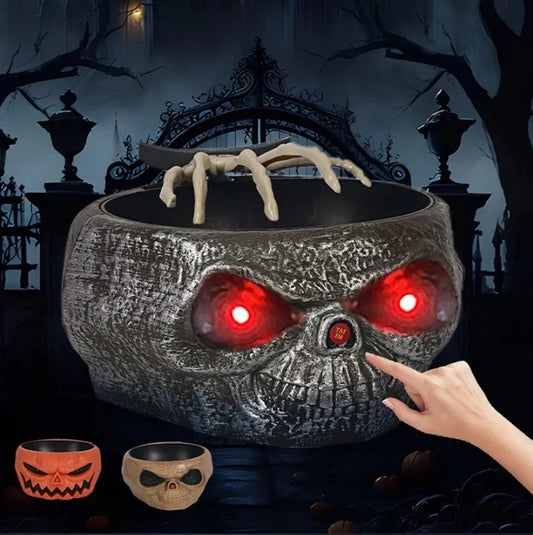 Motion-activated Halloween pumpkin candy bowl with spooky skeleton hand and glowing red eyes