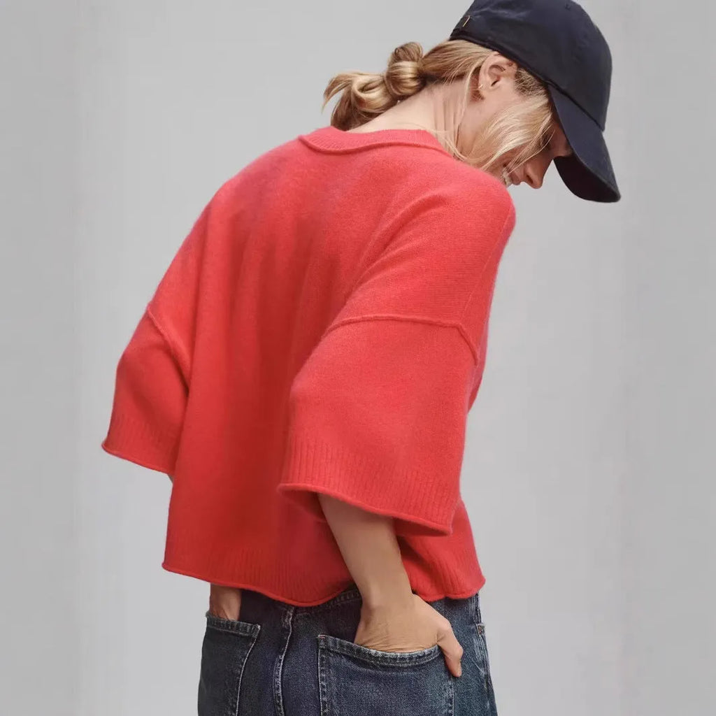 Red viscose short T-shirt with an exposed navel design on a mannequin, front view.