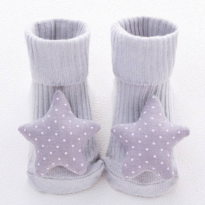 Cotton baby socks in various designs for newborns to 3-month-olds
