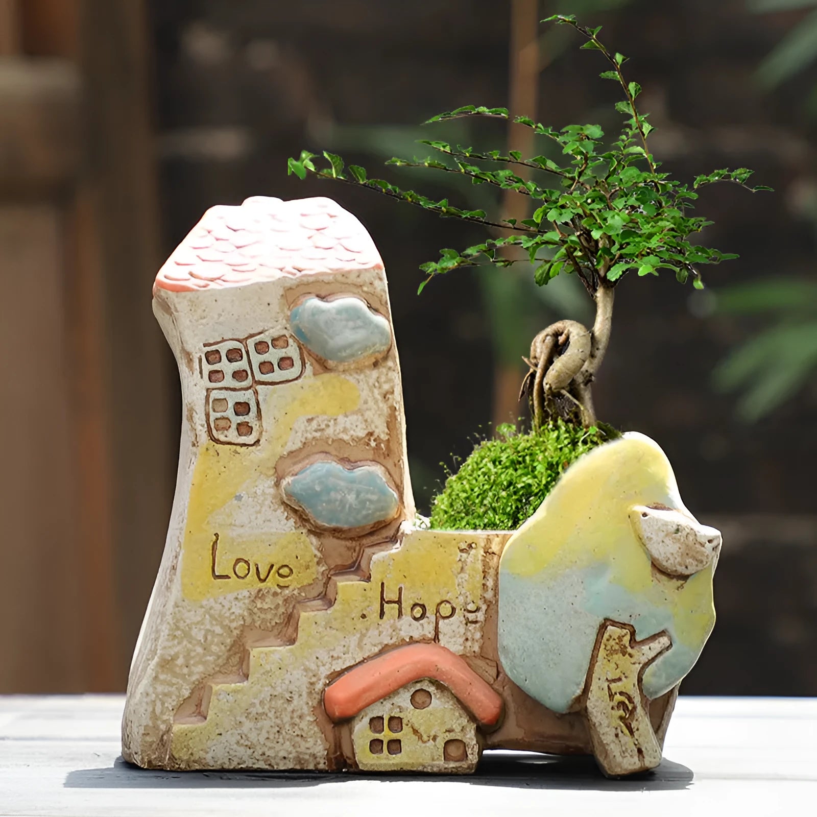 Hand-painted ceramic flower pot with pastoral design and large planting area