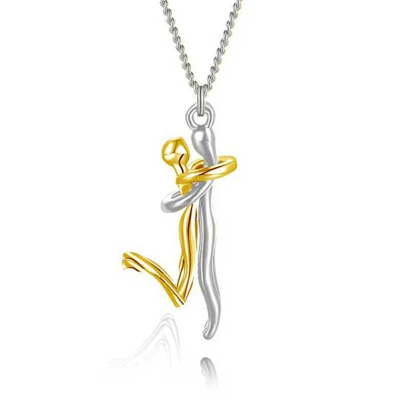 A beautiful 18K gold-plated necklace with a charming doll-like pendant and a cross-chain design, perfect as an anniversary or Valentine's Day gift for couples.