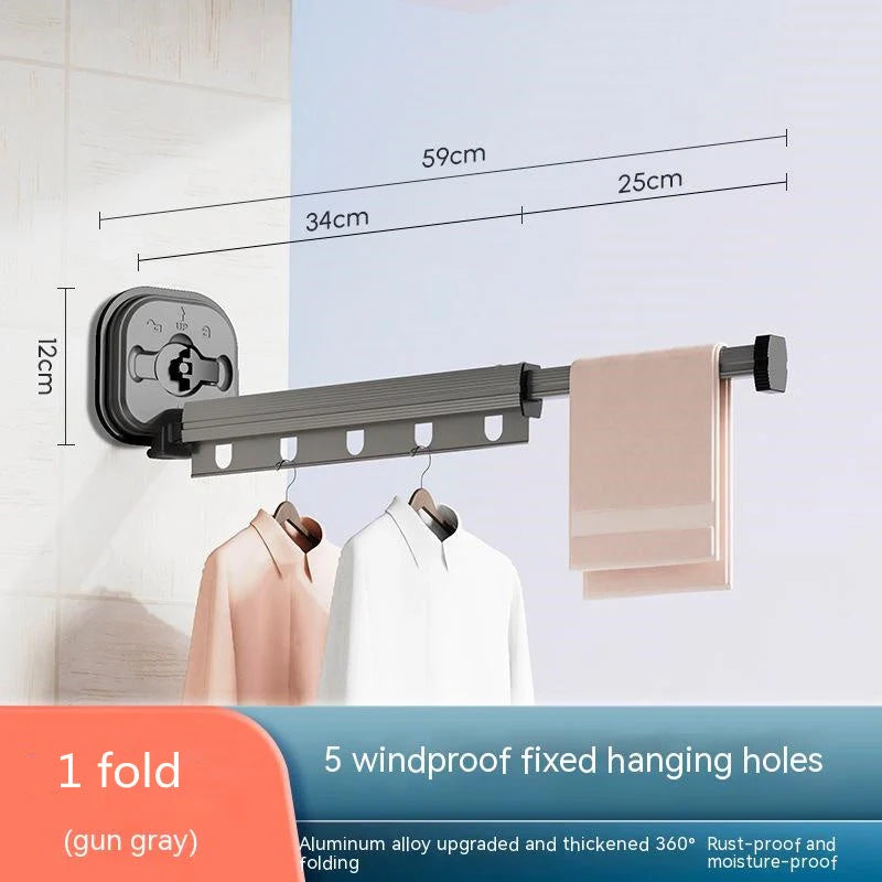 Aluminum retractable clothes drying rack mounted on wall with suction cups