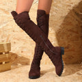 Women's black lace-up over-the-knee boots with flat heel and decorative stitching on a synthetic PU upper.