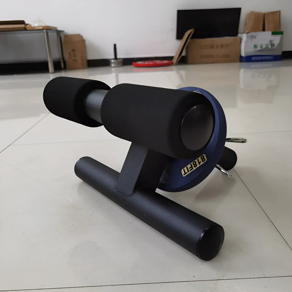 Black steel plate inner calf muscle trainer on a gym floor, dimensions 36x21.5x38.5cm