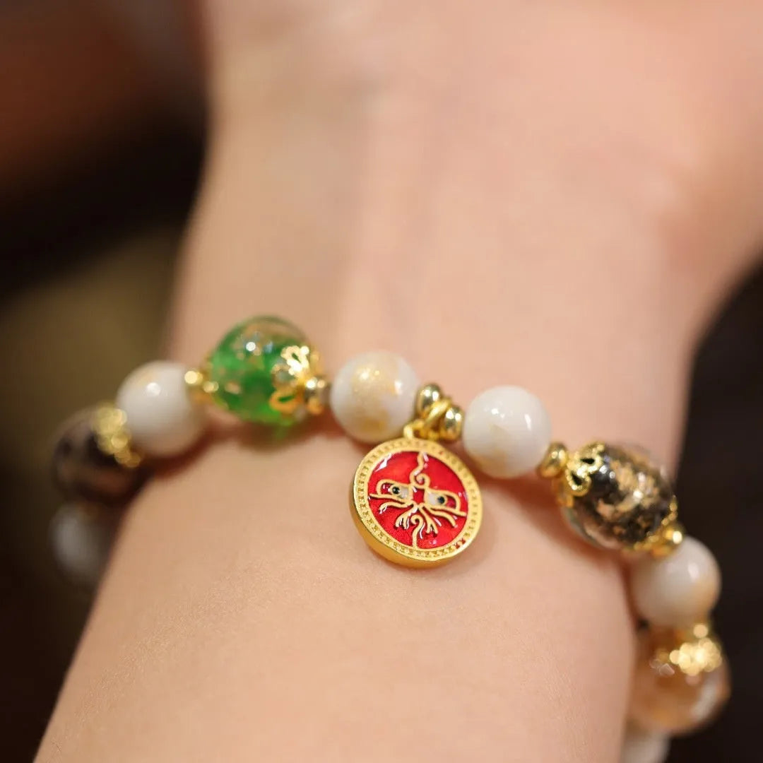 Handmade fragrant grey porcelain bracelet with gods of wealth charm and 10mm geometry beads