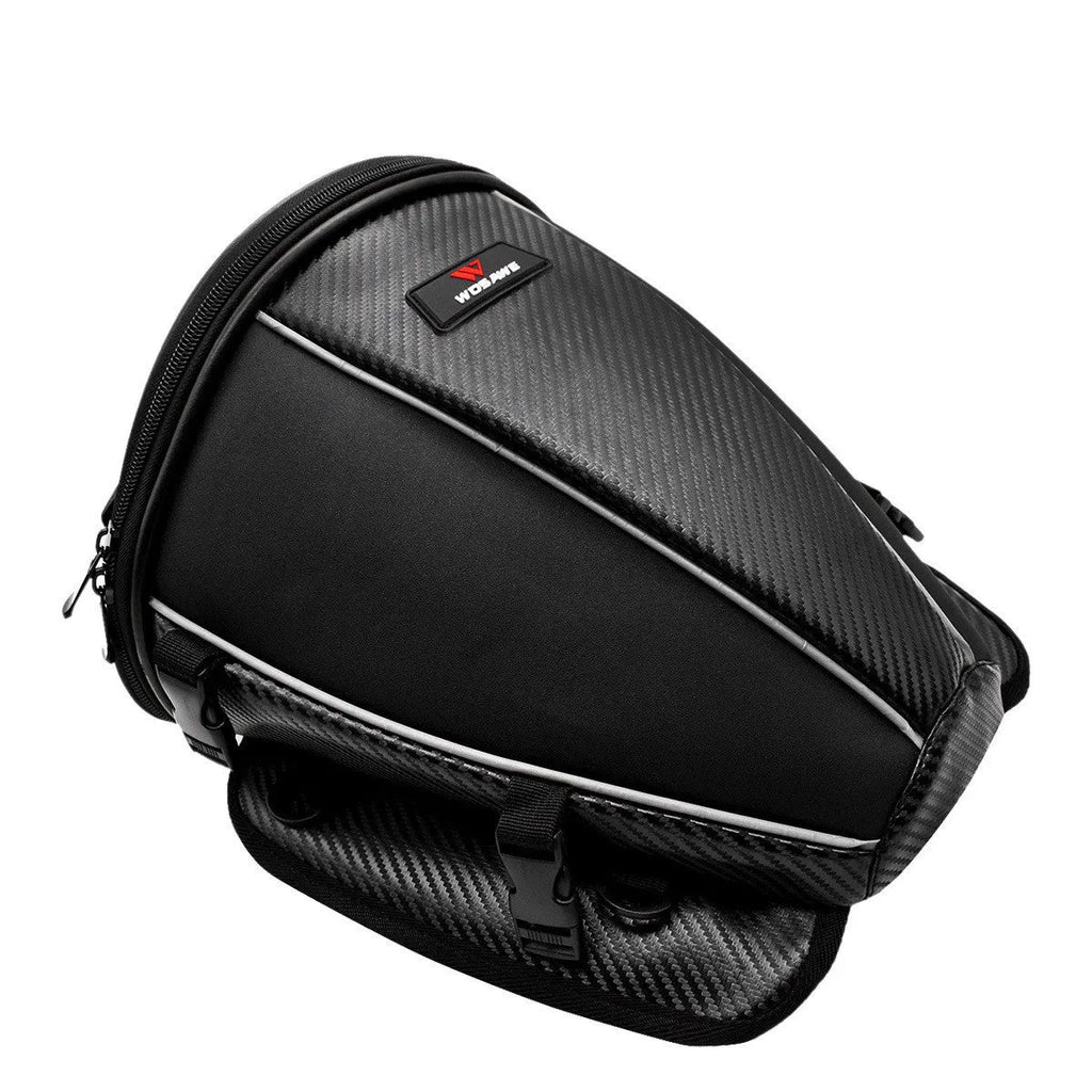 Black motorcycle seat bag with reflective strip, showing convertible crossbody strap and internal pocket organisation