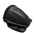 Black motorcycle seat bag with reflective strip, showing convertible crossbody strap and internal pocket organisation