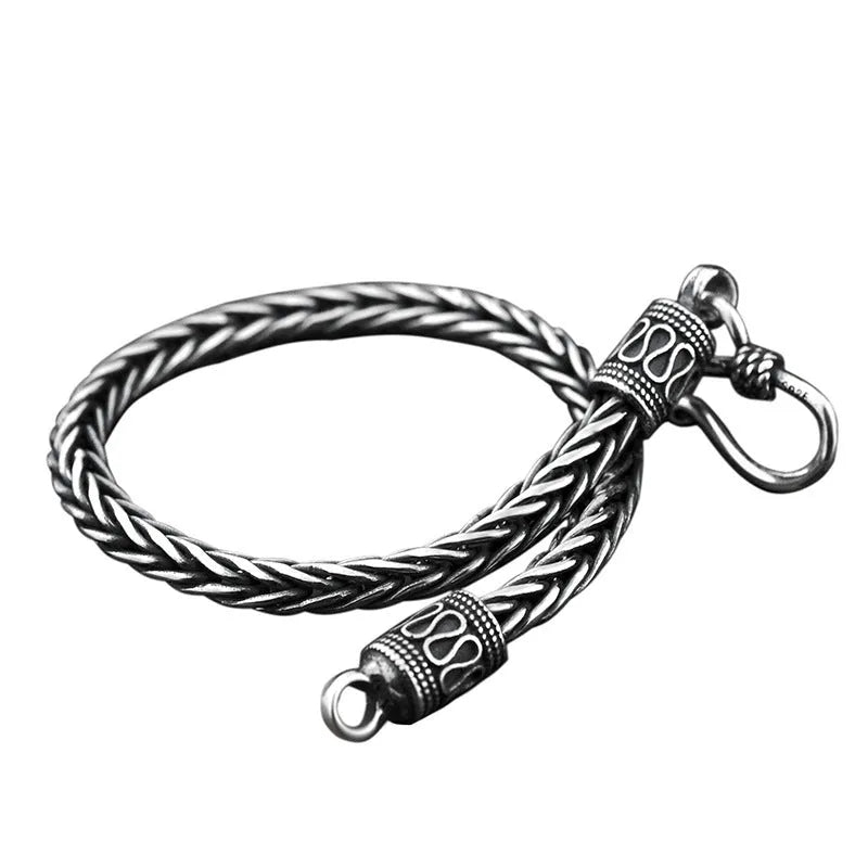 Vintage braided keel 925 silver bracelet for men in retro wave style photo colour