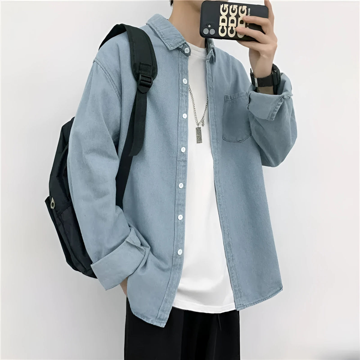 Men's pure cotton long sleeve denim shirt in dark blue, loose cardigan style, front view