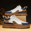 Black and white platform sneakers with thick rubber soles and microfiber leather insoles