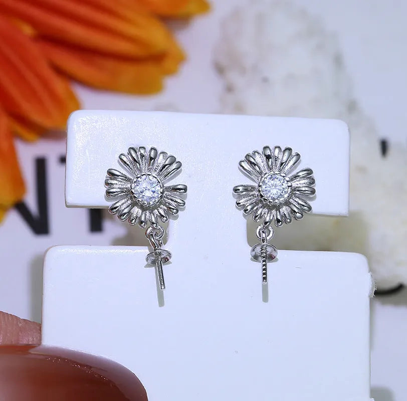 Pair of S925 sterling silver baroque flower earring frames on a plain background.