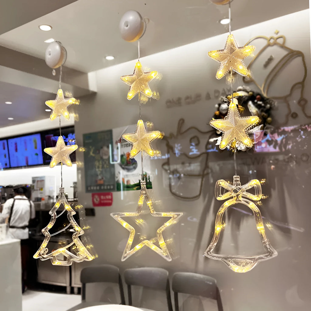 Set of three battery-powered LED Christmas pendant lights with suction cups for window decoration