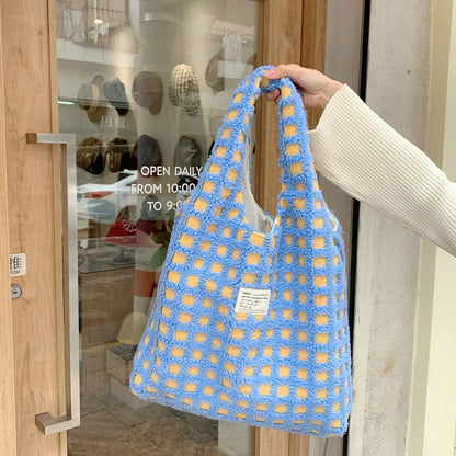 Waffle flannel tote bag in various plaid colors, showcasing large capacity and street trend design