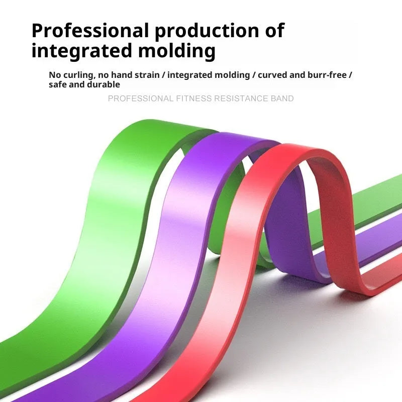 Set of five TPE resistance bands in yellow, red, black, purple, and green on a wooden floor