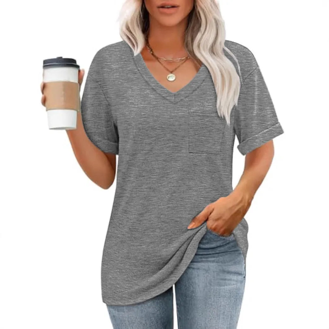 Grey loose fit V-neck T-shirt with a chest pocket on a plain background.