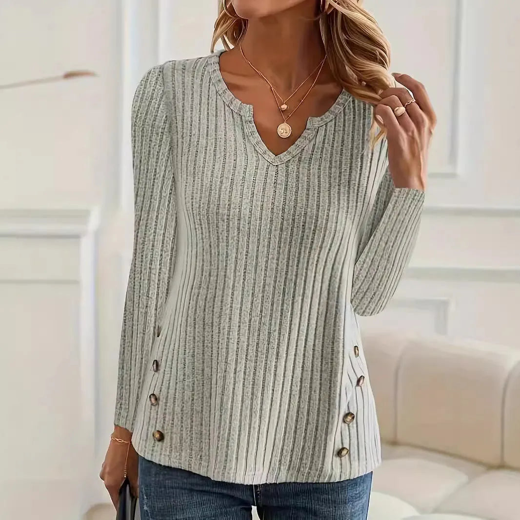 A simple solid-colour knitted button sweater in grey green, shown on a hanger.