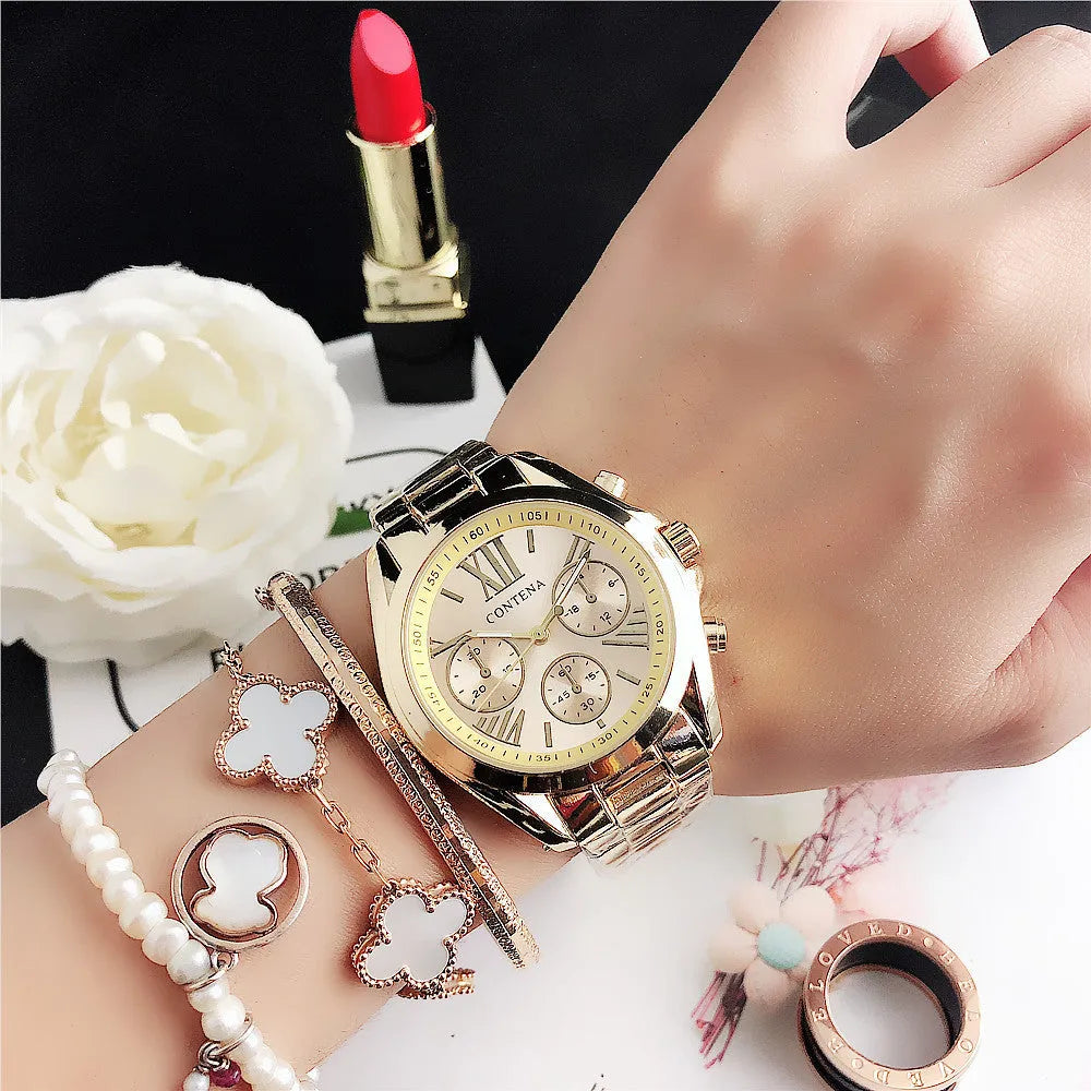 Women's silver rose gold diamond quartz analogue watch with mesh strap on wrist