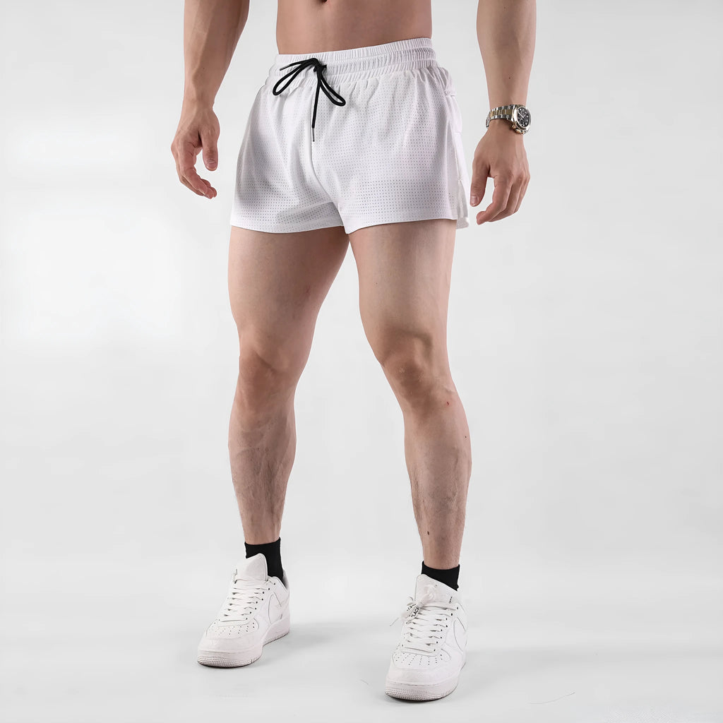 Men's black nylon quick-dry summer shorts laid flat, showing mid-waist and shorts length.