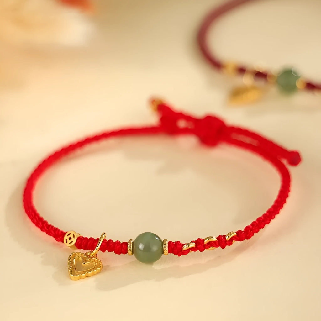 Handmade 925 silver and Hetian jade bracelet with adjustable woven strap