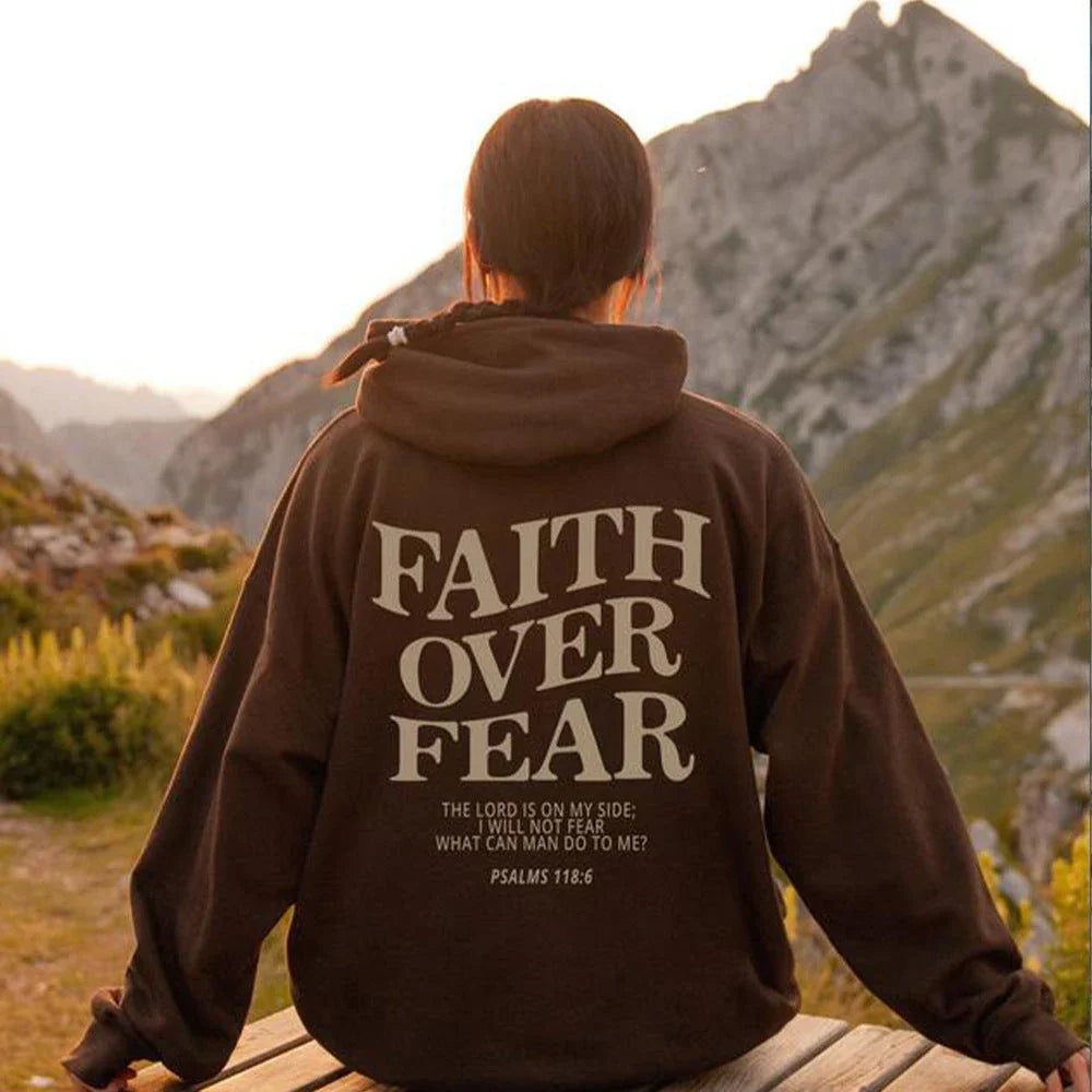 Inspirational Christian hoodie with 'Faith Over Fear' graphic in various colors