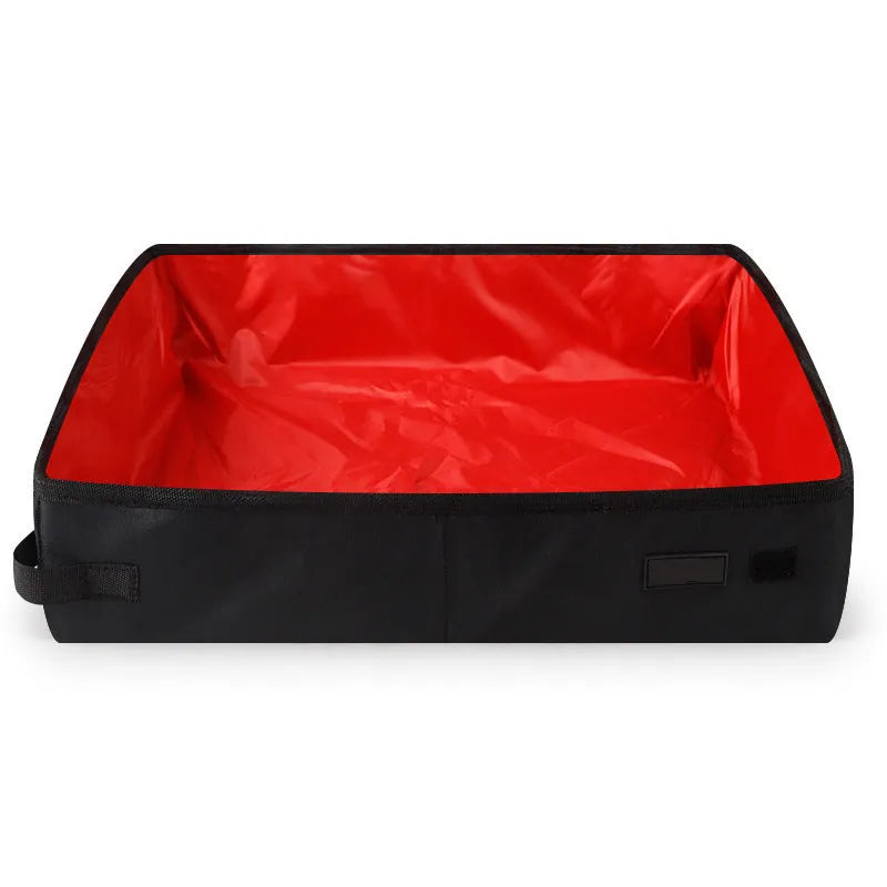 Portable foldable litter box in black Oxford cloth for cats, flat design with open top.