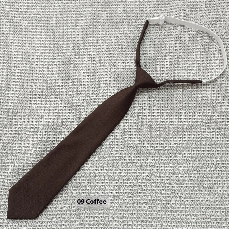 Men's solid navy blue cotton bow tie with arrow style ends on a white background.