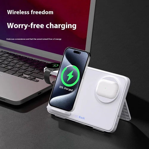 Three-in-one wireless charger in ivory white with a smartphone placed on the charging pad and magnetic support visible