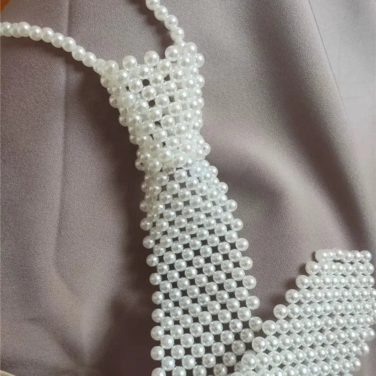 Pearl body chains with adjustable tie closure and hollow out chain design in black colour