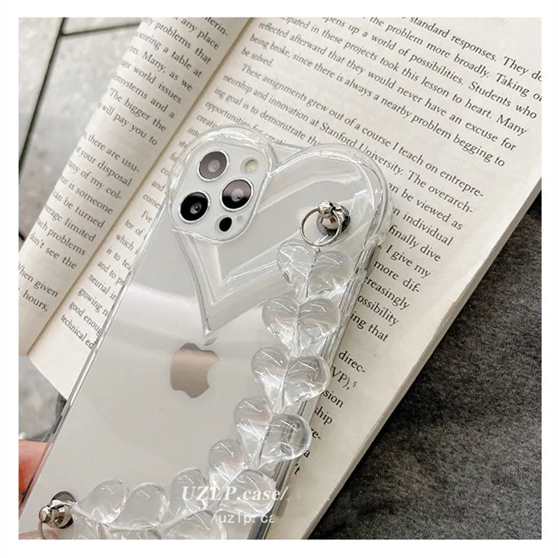 Transparent iPhone case with love bracelet chain design on clear TPU protective shell