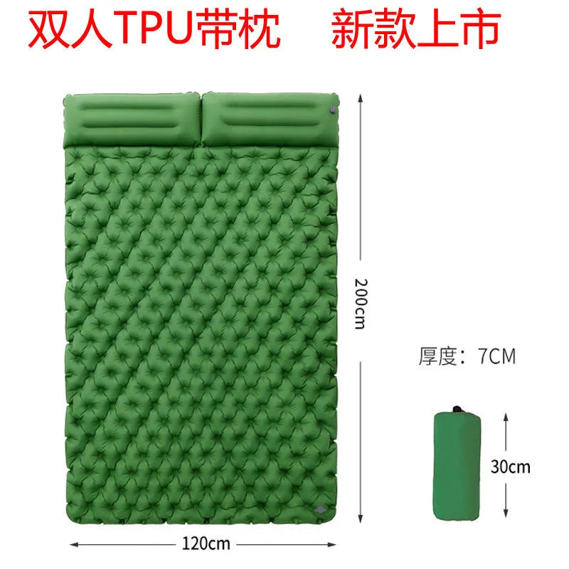 Double-wide camping air mattress with integrated pillow in army green colour, shown inflated.