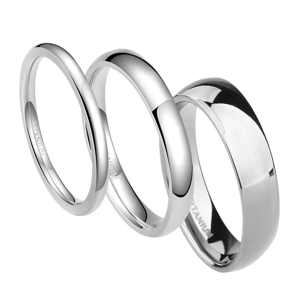 Simple silver titanium steel ring shown in various widths on a size chart.