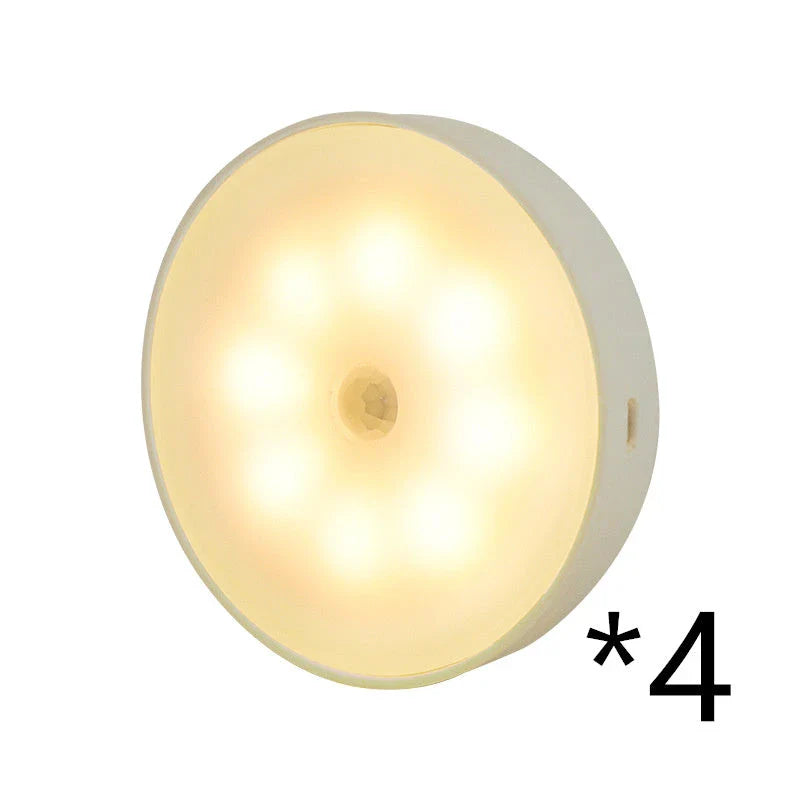 USB rechargeable motion sensor LED puck light for cabinets and night use