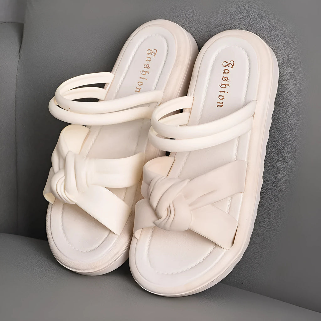 Women's PVC sandals with soft thick back in black and white colour options
