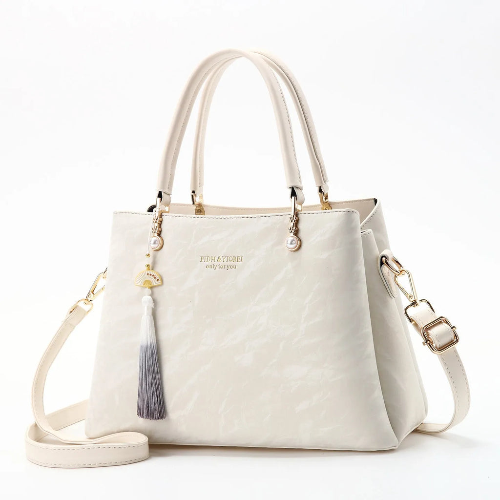 Women's PU leather shoulder bag with square shape and ethnic pattern in four colours