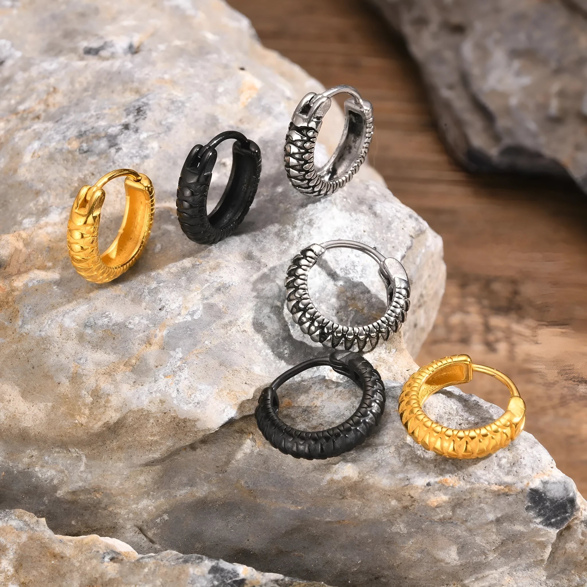 Stainless steel snake pattern earrings in black and gold colour options