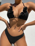 Black women's swimwear set with gathered top and matching shorts on European and American sizing