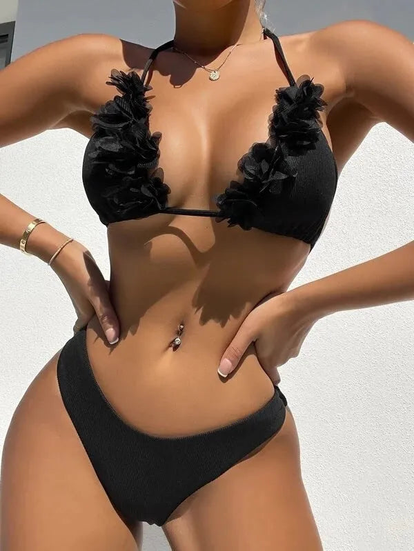Black women's swimwear set with gathered top and matching shorts on European and American sizing