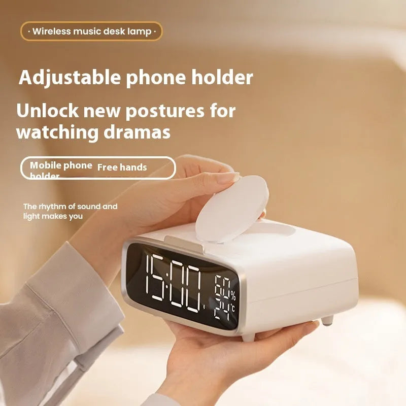 White round Bluetooth speaker wireless charger with night light function on bedside table