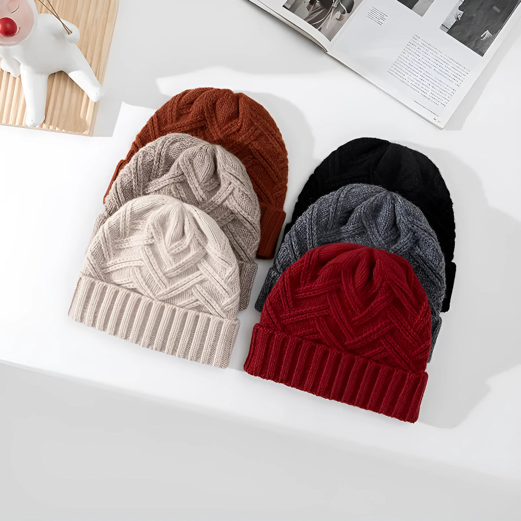 Wool knitted dome hat in ankela red colour with totem pattern detail