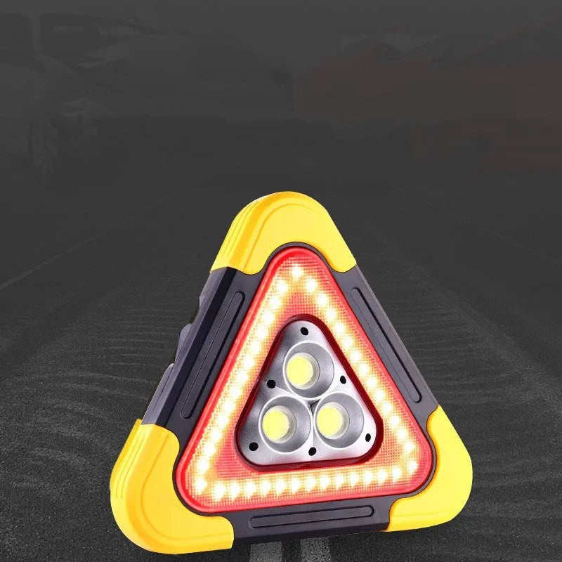 Car mounted tripod warning sign light with solar panel, large and small sizes, showing warning flash mode on a roadside