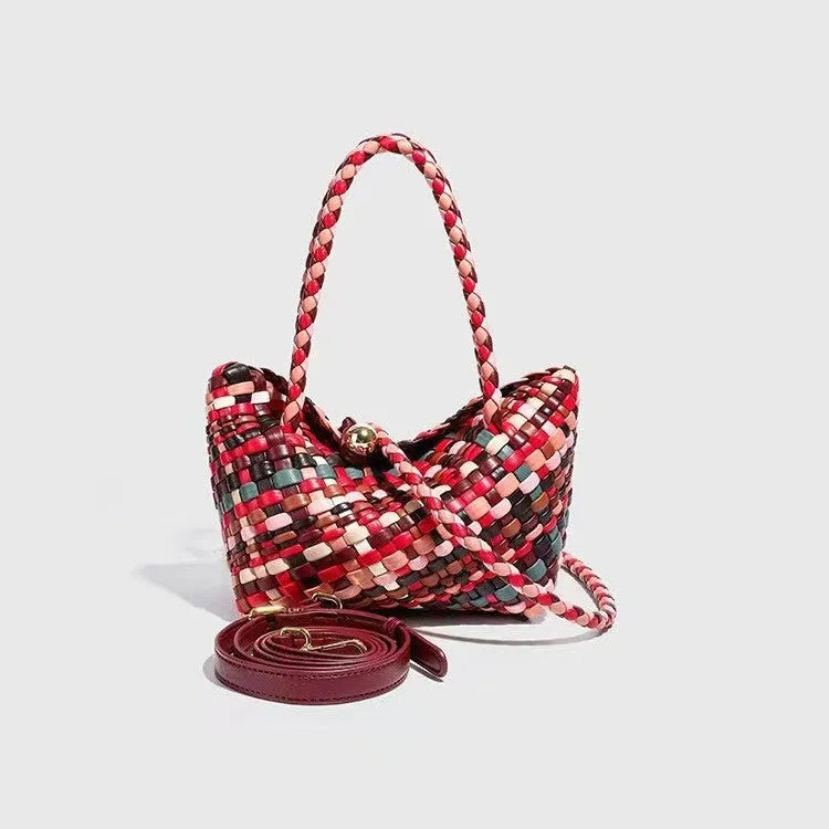 Women's woven PU leather shoulder bag showing handmade detailing and 18x11x14cm dimensions
