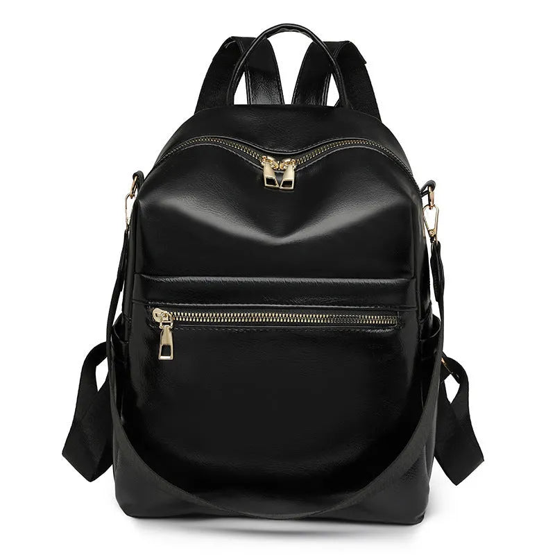PU backpack with telescopic handle in black, square vertical shape, 24x15x31cm, sitting upright on floor